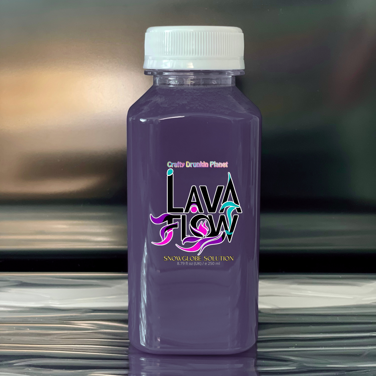 Purple bottle labeled 'Lava Flow' on a reflective surface with a blurred background
