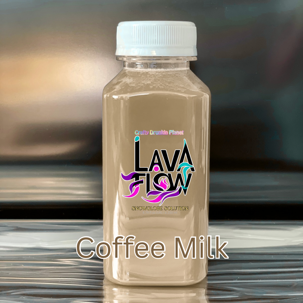 Bottle of Lava Flow Coffee Milk on a reflective surface with a blurred background