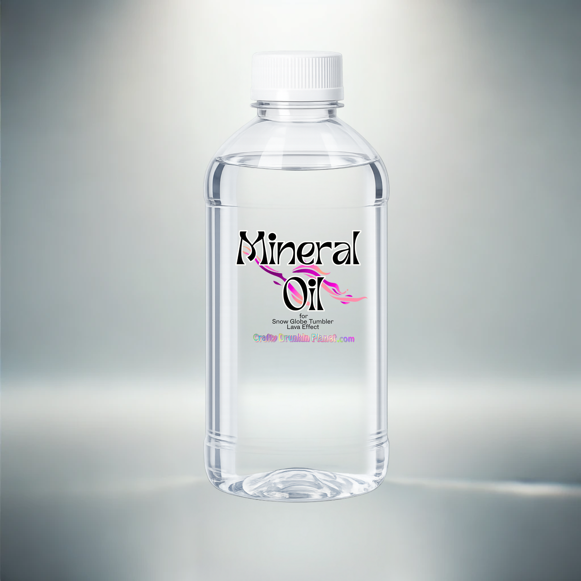 Clear bottle of mineral oil with a white label on a gray background