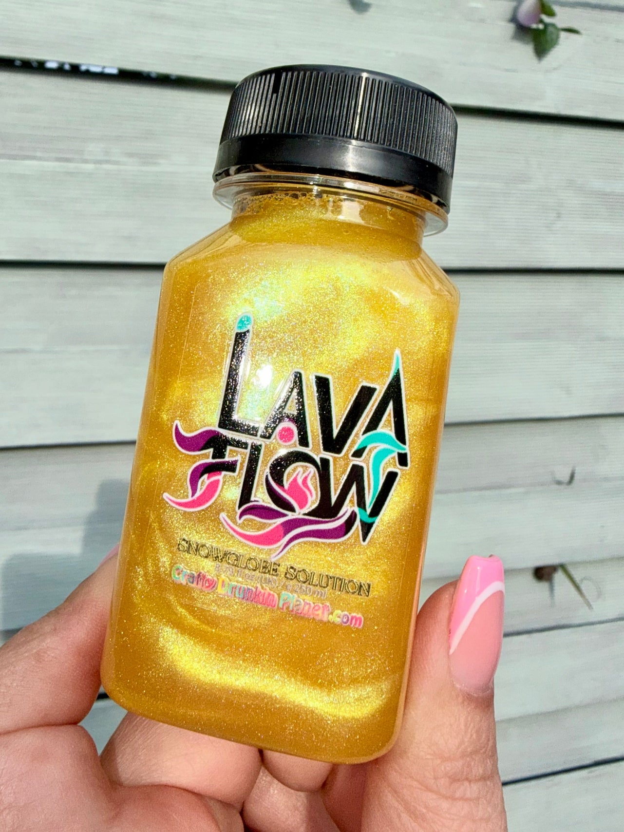 Bottle of Yellow MoonSun lava flow solution
