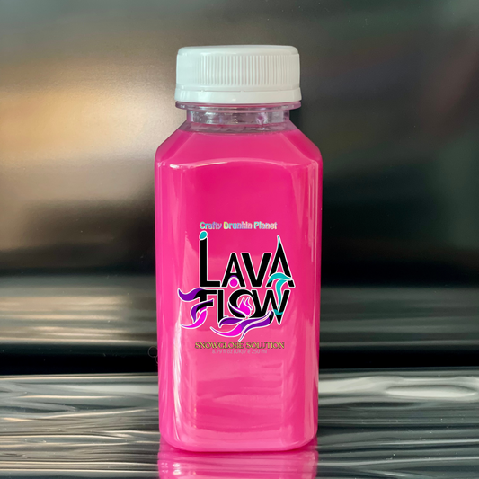 Magenta Pink bottle labeled 'Lava Flow' on a reflective surface with a blurred background