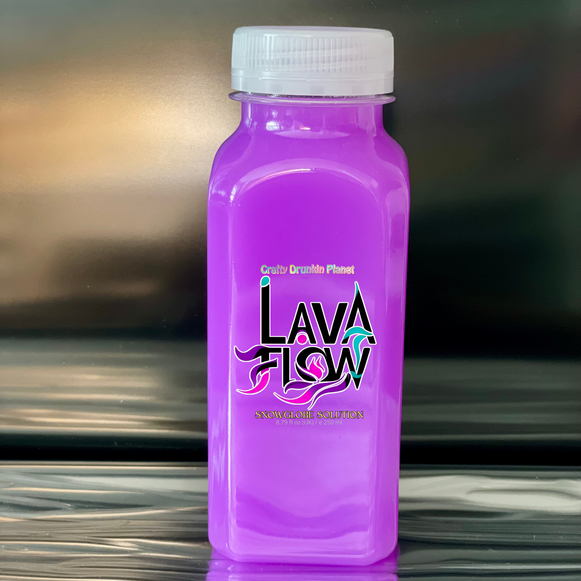 Neon Purple bottle labeled 'Lava Flow' snowglobe solution on a reflective surface with a blurred background.